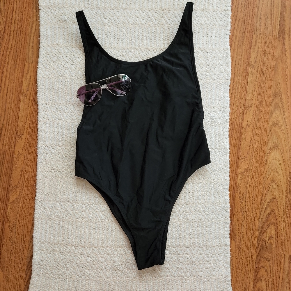 High Leg Black One-Piece